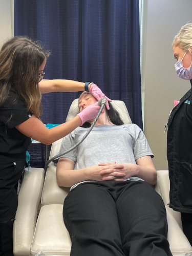 Patient receiving a Radiofrequency Microneedling treatment