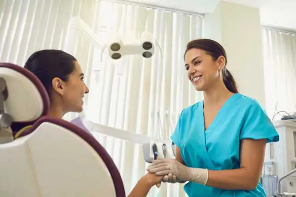 Girl and facial expert having a friendly conversation